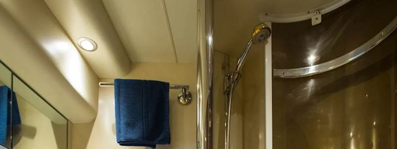 Luxury yacht bathroom interior, featuring modern amenities, sleek design, and compact efficiency for comfortable Adriatic cruising.