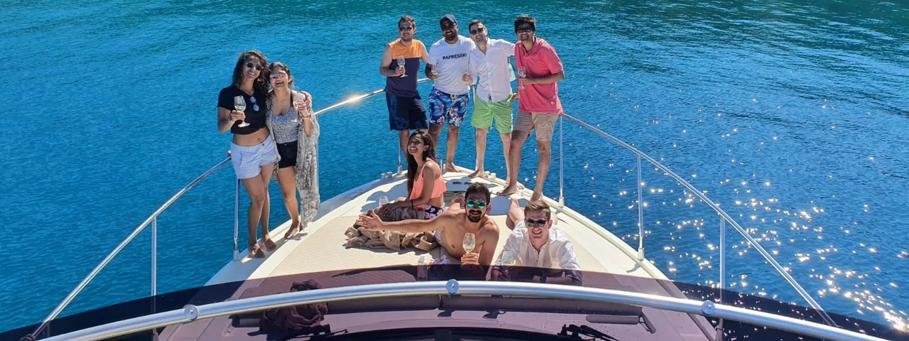 Group celebrating on a Dubrovnik yacht charter.