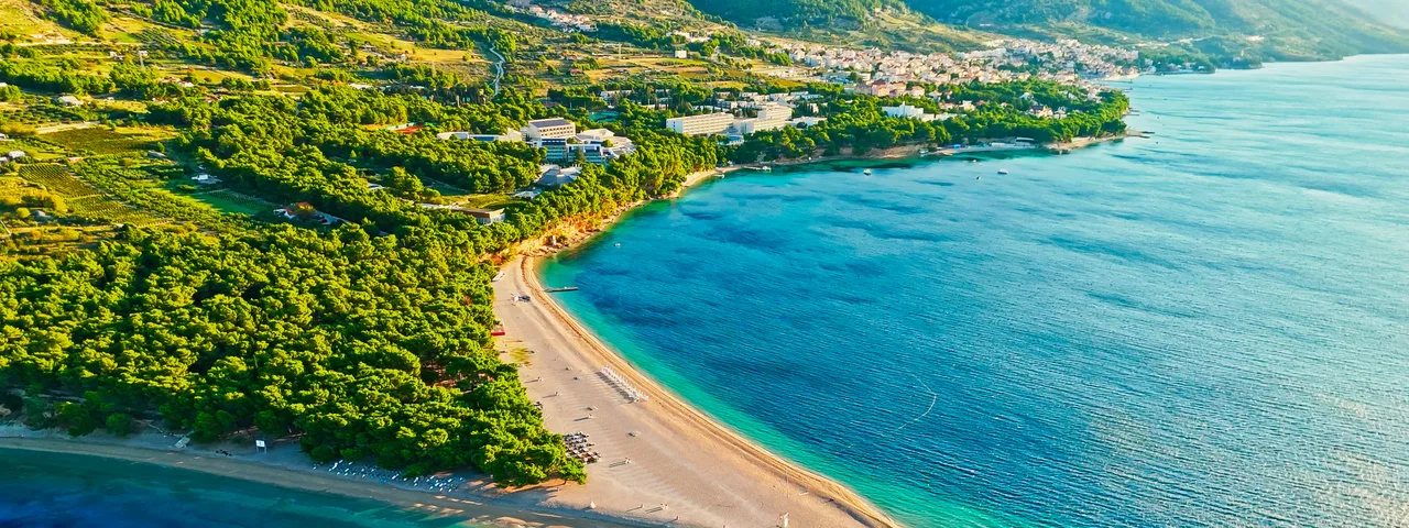 Aerial view of the iconic Zlatni Rat (Golden Horn) beach in Bol, Brač Island, Croatia, with stunning turquoise Adriatic waters.