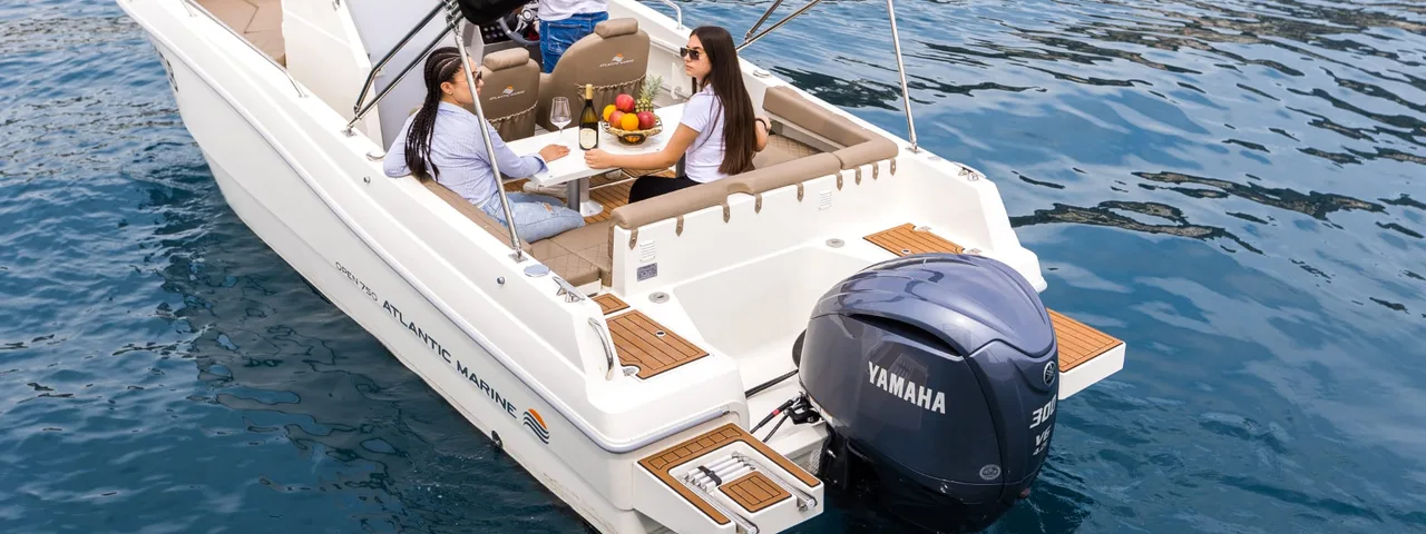 Women relaxing on a luxury day boat in the beautiful Adriatic Sea, enjoying a leisure trip in Croatia.