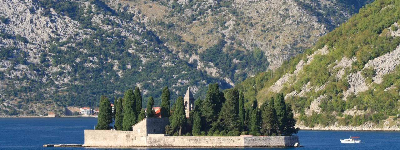 Inside Boka bay - Montenegro, near Kotor, human made isle of rocks...