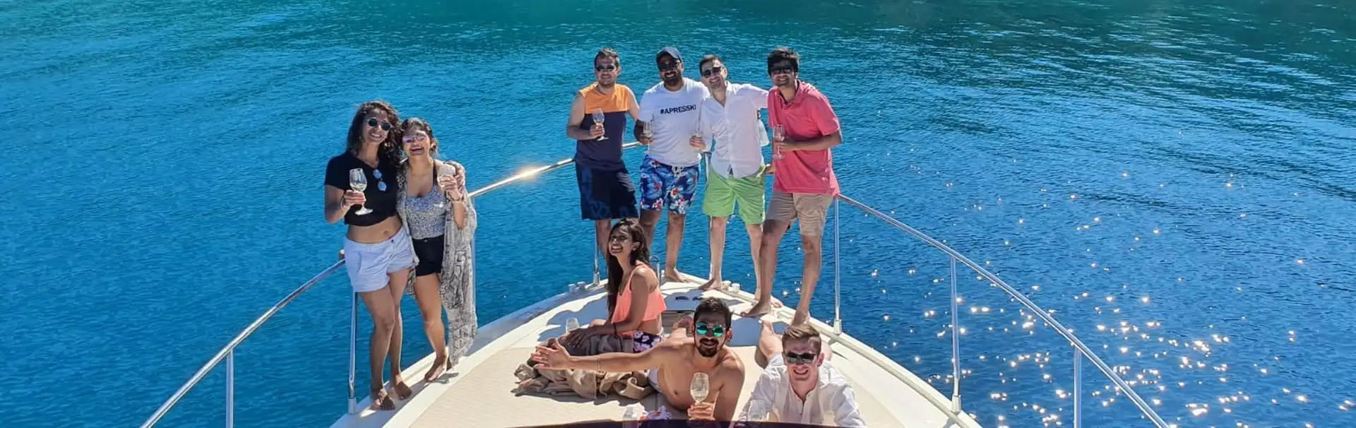 Group celebrating on a Dubrovnik yacht charter.