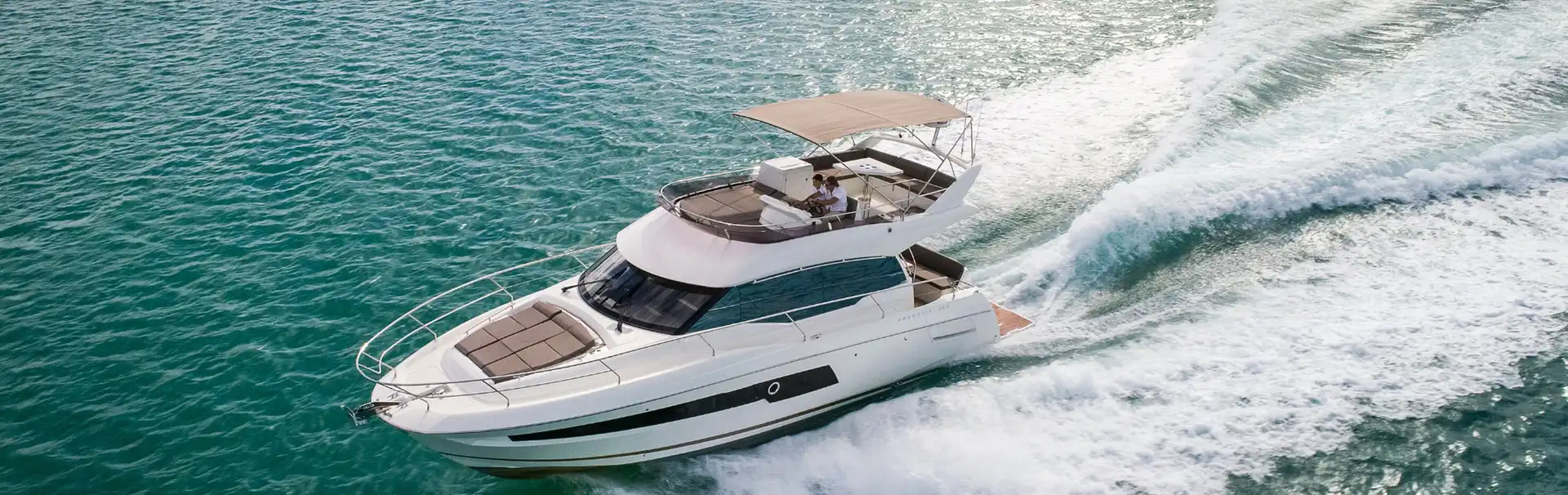 Luxury yacht Prestige 420 Fly cruising through turquoise Adriatic waters near Dubrovnik