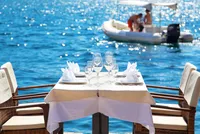 Waterfront dining in Dubrovnik, Croatia. Book your luxury travel experience with Tendo. 