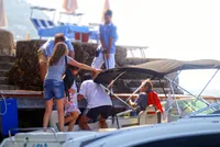 Tendo staff assists guests boarding a luxury speedboat in Dubrovnik, Croatia, ensuring a smooth and enjoyable start to their journey.