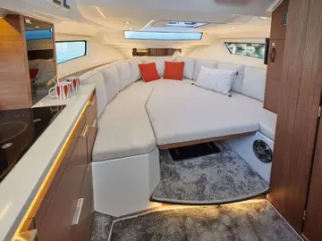 Cap Camarat 10 -interior with comfortable seating area, perfect for Dubrovnik boat charters and Elafiti Islands private tours.