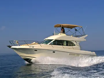 Prestige 36 Fly motorboat cruising crystal-clear Adriatic waters near Dubrovnik