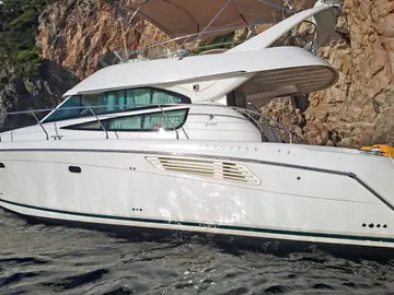 Luxury yacht cruising along Dubrovnik's stunning coastline, offering exclusive charter experiences for discerning travelers