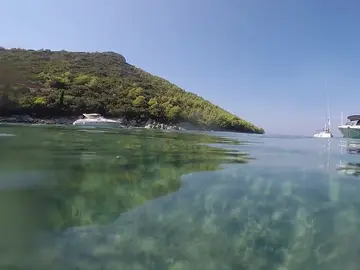 Crystal-clear Adriatic waters near Dubrovnik. Book a boat tour with Tendo Travel.