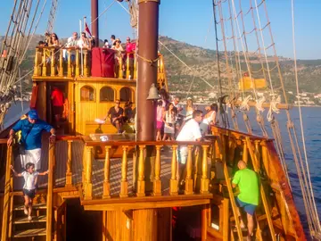 Guests on the wooden deck of a Dubrovnik luxury group event ship