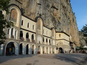 Panoramic view of the Ostrog Monastery and surrounding Montenegrin mountain landscape