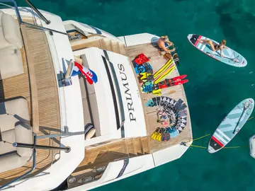 Primus water toys displayed — jet ski, paddleboards, inflatable slide