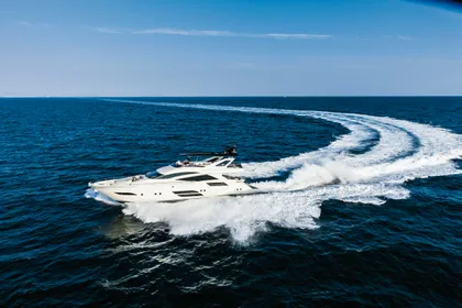 Private yacht cruising the Adriatic along the Budva Riviera near Sveti Stefan, Montenegro