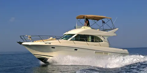 Prestige 36 Fly motorboat cruising crystal-clear Adriatic waters near Dubrovnik