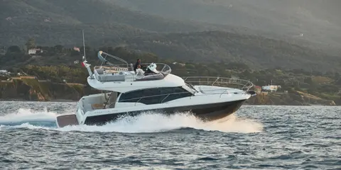 Prestige 460 Fly luxury yacht cruising off Dubrovnik on a tailor-made private boat tour.