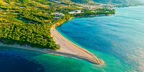 Aerial view of the iconic Zlatni Rat (Golden Horn) beach in Bol, Brač Island, Croatia, with stunning turquoise Adriatic waters.