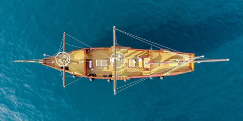 Aerial view of a Dubrovnik luxury event ship cruising over the blue Adriatic Sea