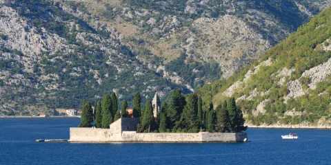 Inside Boka bay - Montenegro, near Kotor, human made isle of rocks...