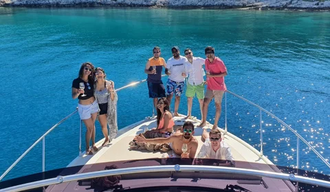 Group celebrating on a Dubrovnik yacht charter.