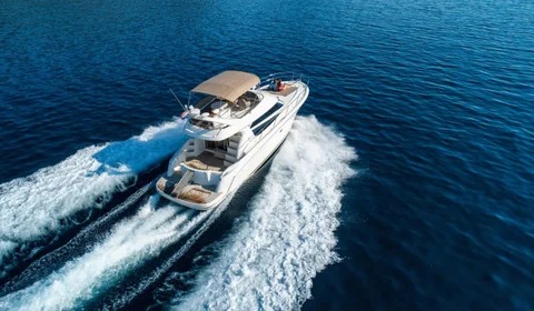 Luxury yacht Prestige 42 cruising on deep blue Adriatic Sea near Dubrovnik, offering premium comfort and style for unforgettable Croatian adventures