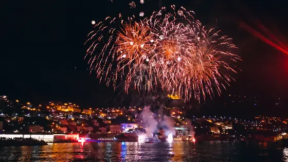 Spectacular night fireworks display over a Dubrovnik waterfront on Summer Festival opening.
