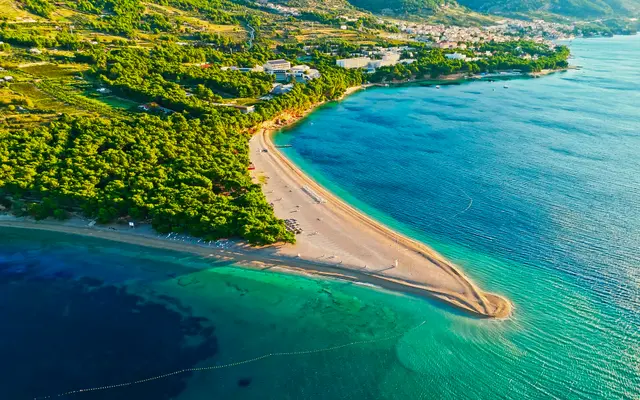 Aerial view of the iconic Zlatni Rat (Golden Horn) beach in Bol, Brač Island, Croatia, with stunning turquoise Adriatic waters.