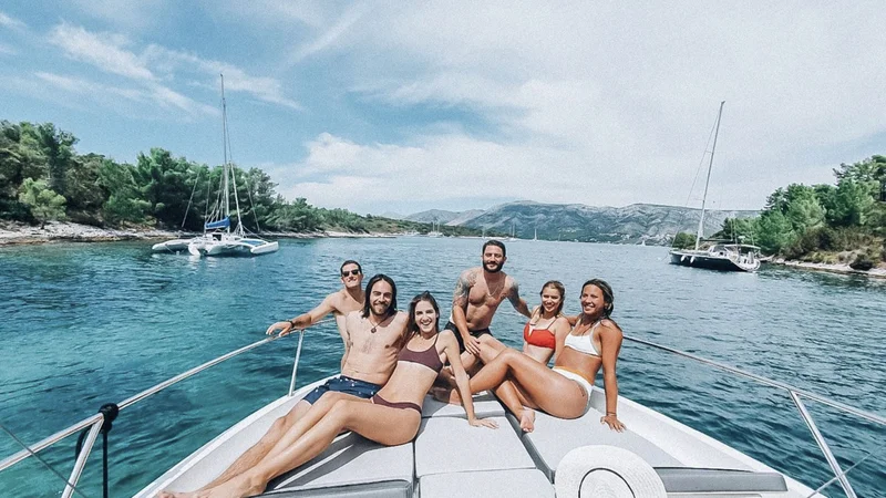 Friends enjoy a luxury boat transfer from Dubrovnik to Hvar with Tendo.hr.