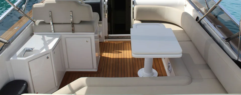 Luxurious yacht ITAMA 45 deck with spacious seating area, perfect for Adriatic Sea cruises from Dubrovnik, Croatia.