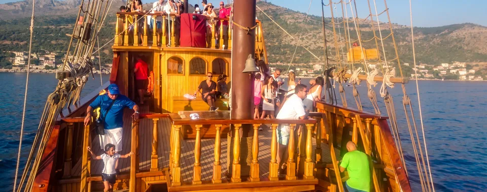 Guests on the wooden deck of a Dubrovnik luxury group event ship