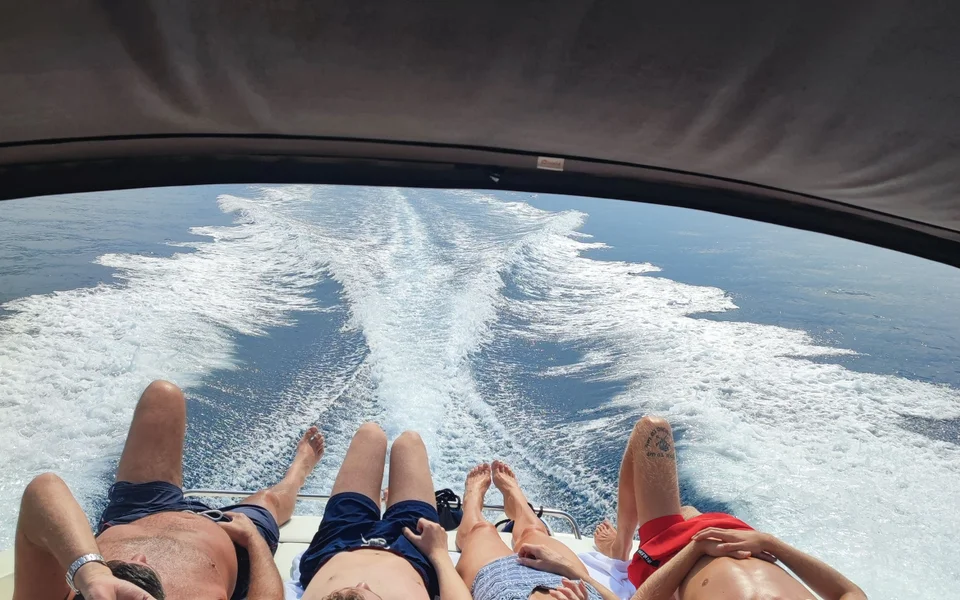 Dubrovnik boat tour wake, crystal clear Adriatic Sea