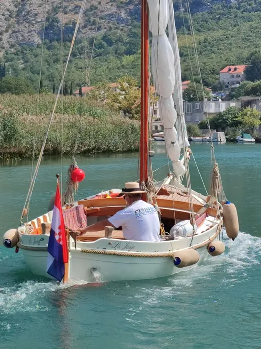 Dubrovnik sunset boat tour on Ombla River. Scenic views, tranquil waters, unforgettable experience. Book your tour today!