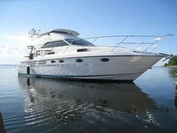 Luxury yacht anchored in calm waters near Dubrovnik, offering exclusive charter experiences for unforgettable Adriatic adventures