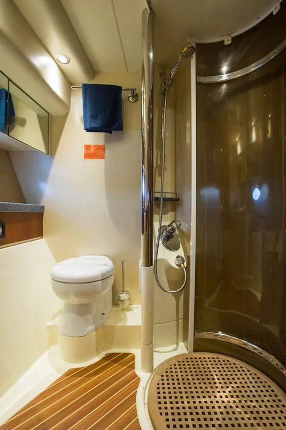 Luxury yacht bathroom interior, featuring modern amenities, sleek design, and compact efficiency for comfortable Adriatic cruising.