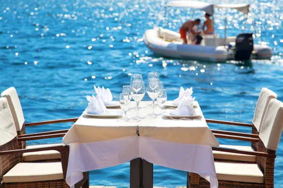 Waterfront dining in Dubrovnik, Croatia. Book your luxury travel experience with Tendo.