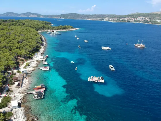 Crystal clear bay at Pakleni Islands — private boat escape from Hvar