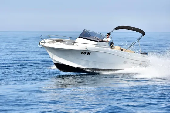Luxury speedboat cruising on crystal-clear Adriatic waters near Dubrovnik, perfect for exploring Dubrovnik county coastline and Elaphiti islands
