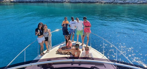 Group celebrating on a Dubrovnik yacht charter.