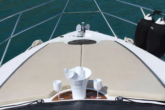 Luxury yacht bow with champagne service, perfect for Dubrovnik coastal cruises. Elegant setup for memorable Adriatic experiences.