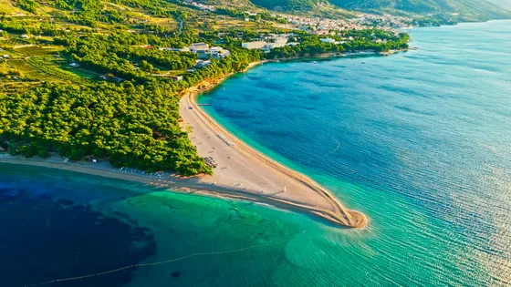 Aerial view of the iconic Zlatni Rat (Golden Horn) beach in Bol, Brač Island, Croatia, with stunning turquoise Adriatic waters.
