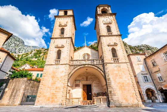 Cathedral of Saint Tryphon with twin bell towers in Kotor old town square, Montenegro