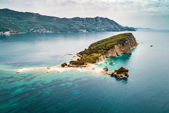 Sveti stefan viewpoint romantic couple panorama montenegro yi8d94