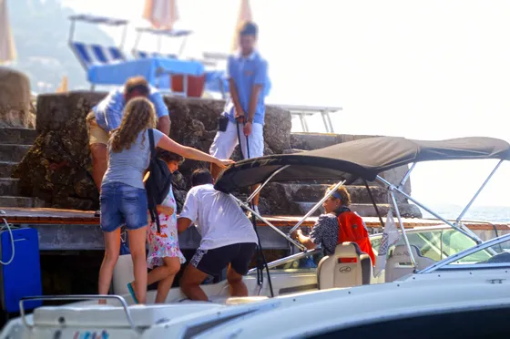 Tendo staff assists guests boarding a luxury speedboat in Dubrovnik, Croatia, ensuring a smooth and enjoyable start to their journey.