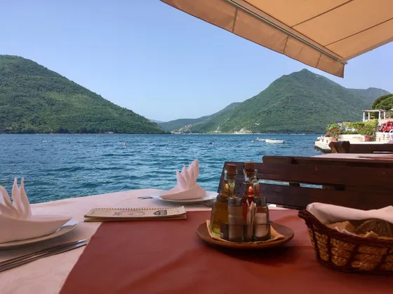 Waterfront dining in Dubrovnik. Book your luxury trip with Tendo.