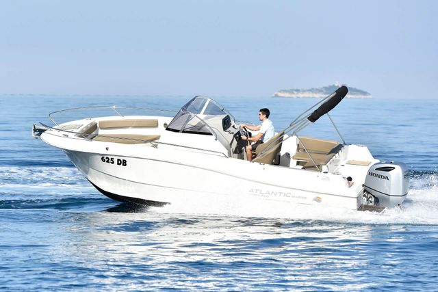 Luxury speedboat cruising Adriatic Sea near Dubrovnik, perfect for day trips and coastal exploration from Croatian shores