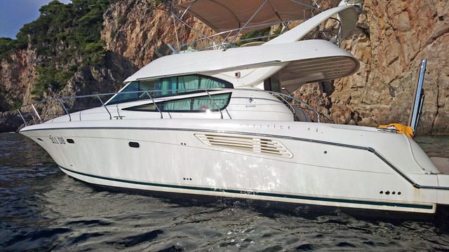 Luxury yacht cruising along Dubrovnik's stunning coastline, offering exclusive charter experiences for discerning travelers