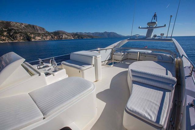 Luxury yacht deck with sunbeds, ready to set sail from Dubrovnik, Croatia.