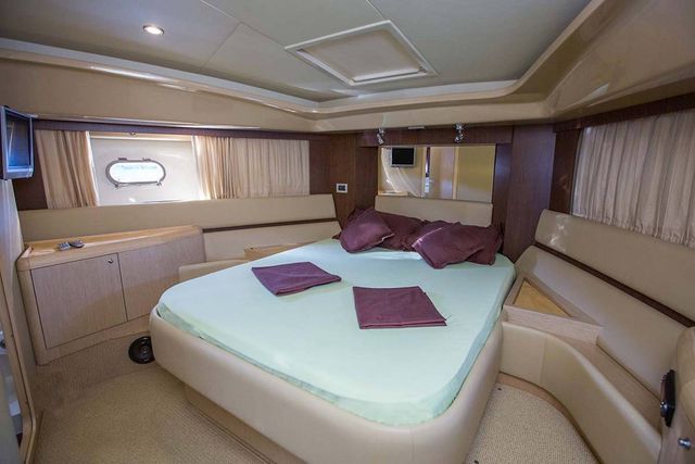 Luxurious cabin with double bed on Tendo yacht charter, departing from Dubrovnik.